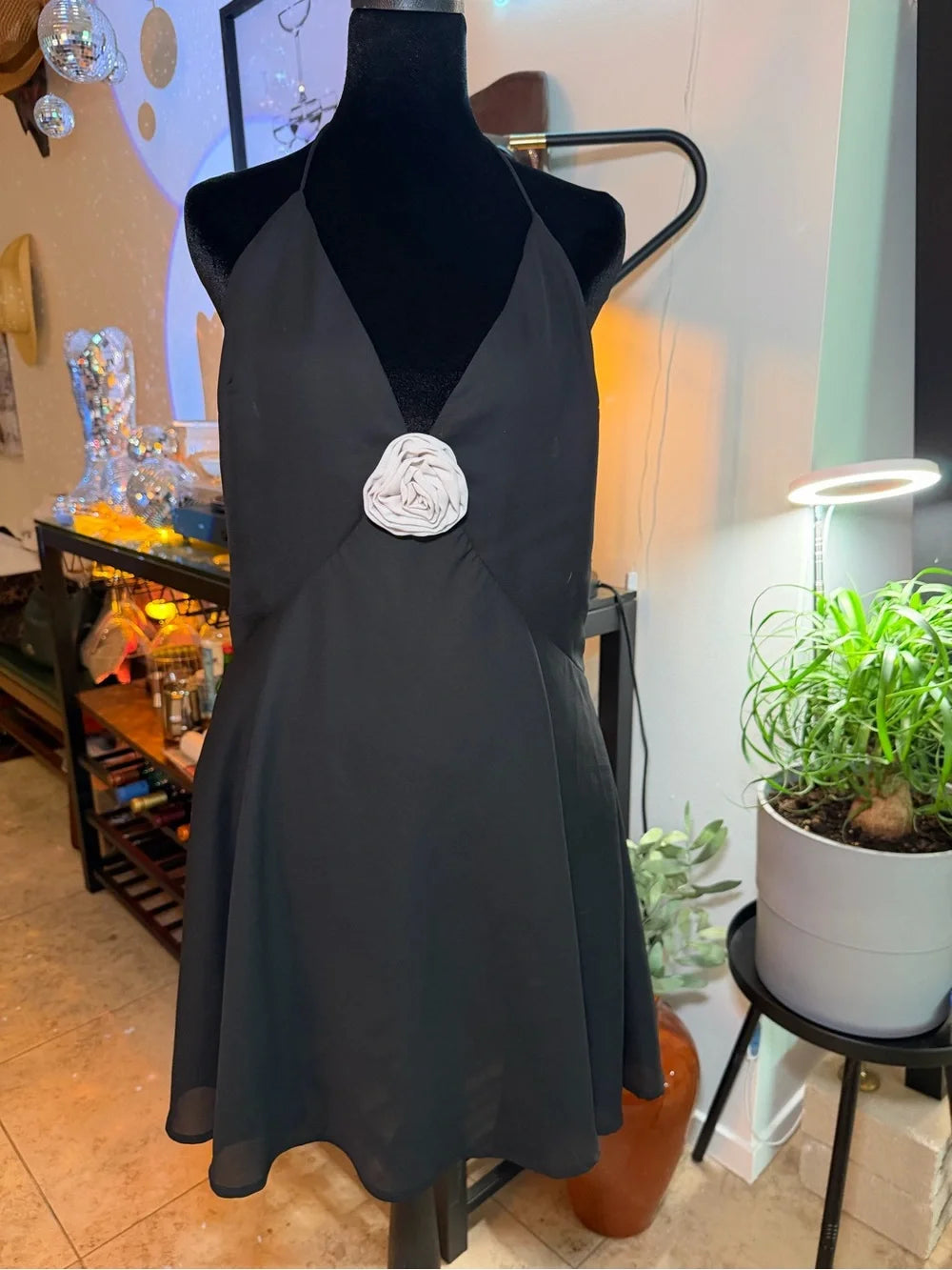 Black Halter Mini Dress with White Rosette Accent