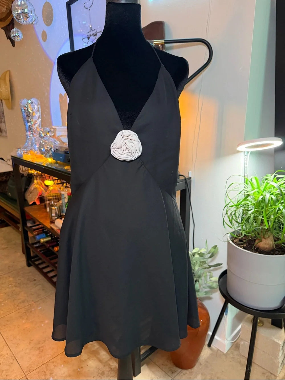 Black Halter Mini Dress with White Rosette Accent