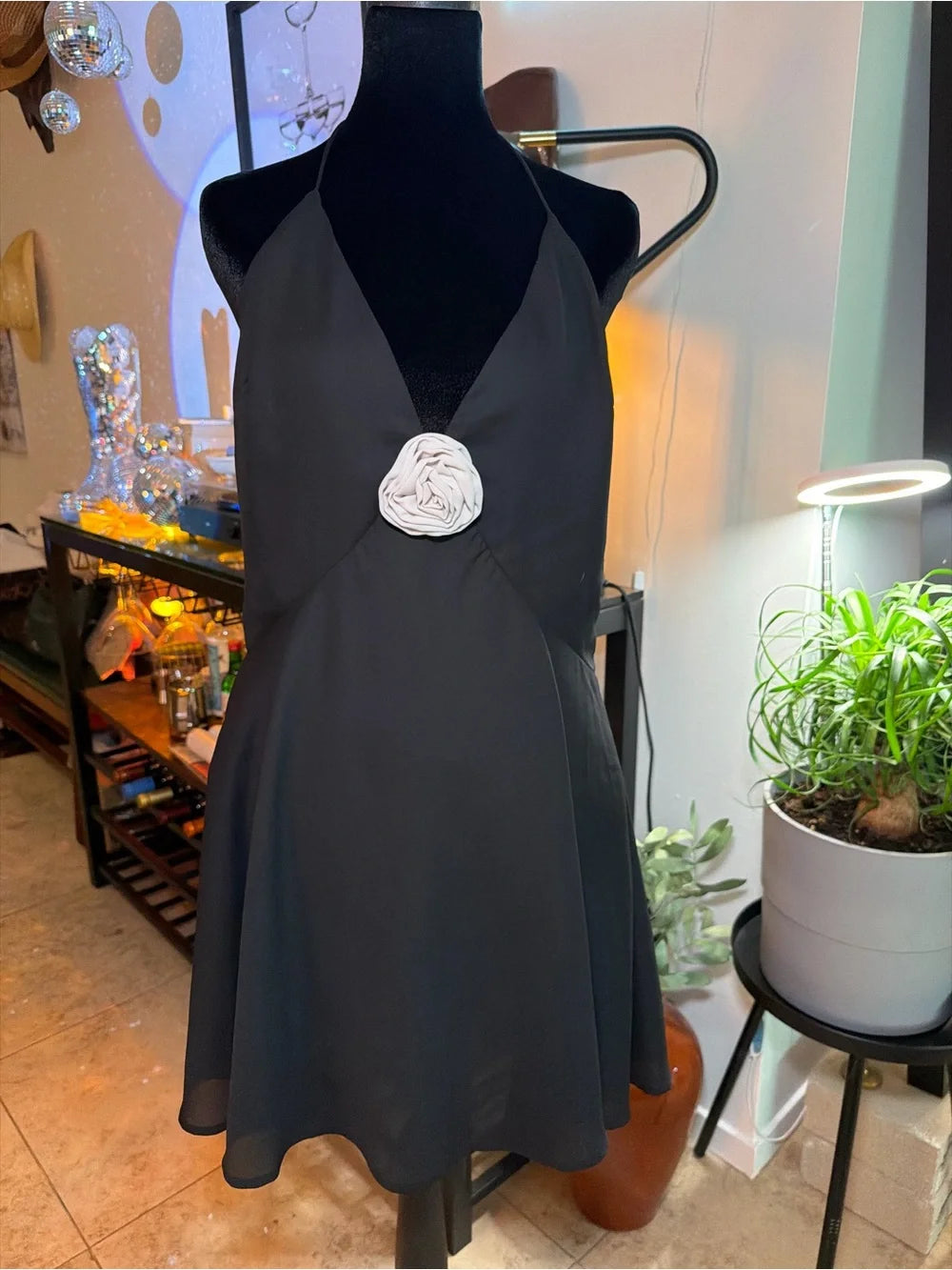 Black Halter Mini Dress with White Rosette Accent