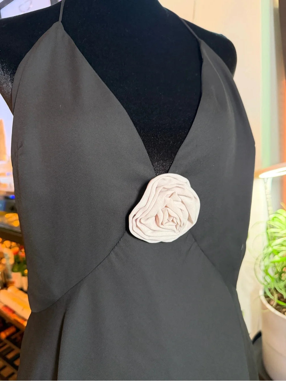 Black Halter Mini Dress with White Rosette Accent